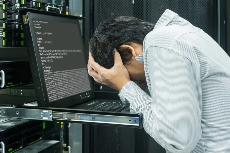 Optometrist reviewing data loss prevention strategy on a server